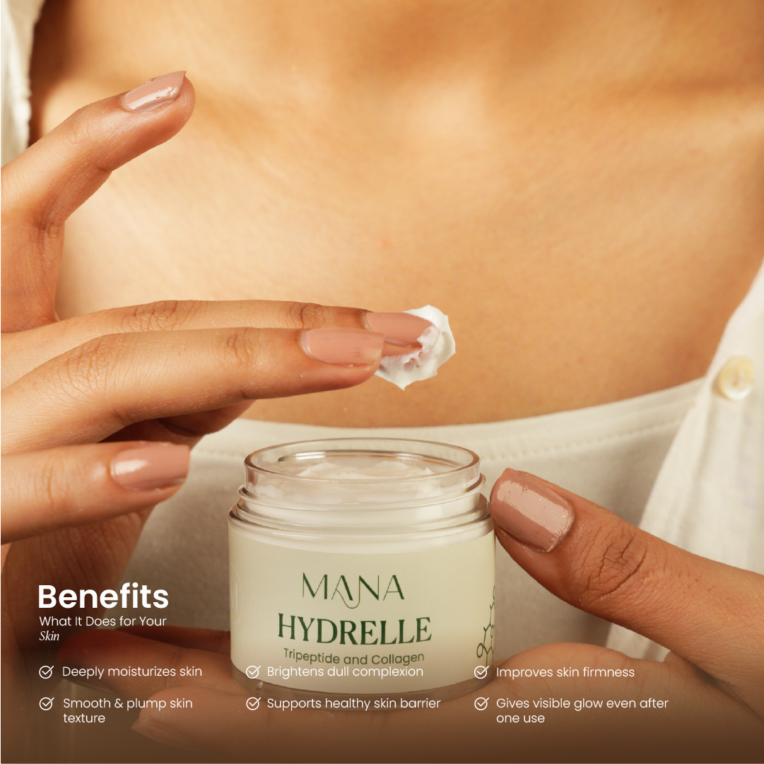 Person applying cream to their arm with a jar of 'Mana Hydrelle' cream in the foreground.